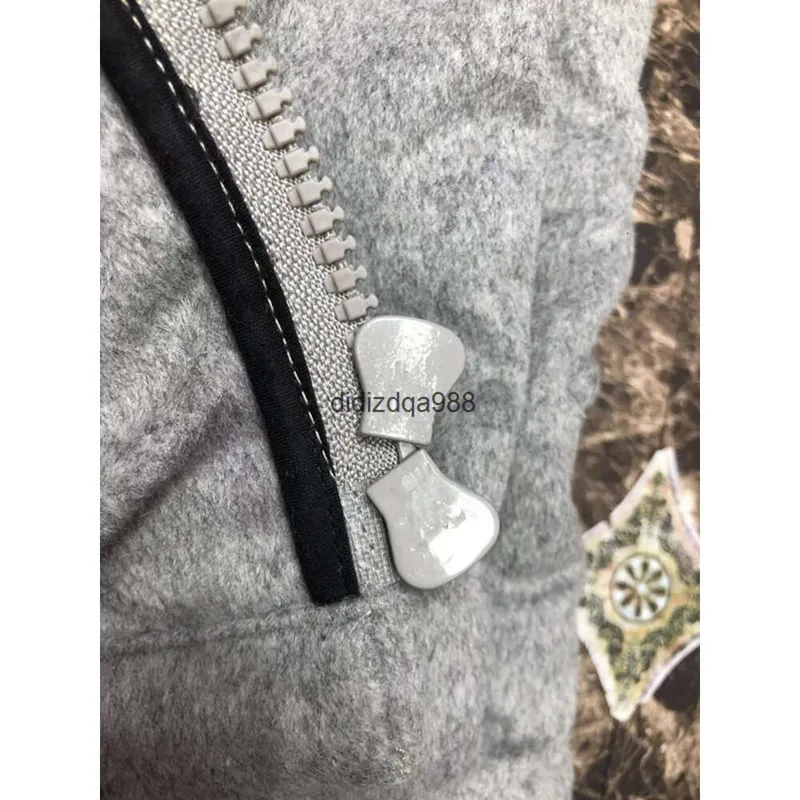 Diseñador para hombre Invierno Down Jacket Parkas manga larga tibia de color gris claro blanco