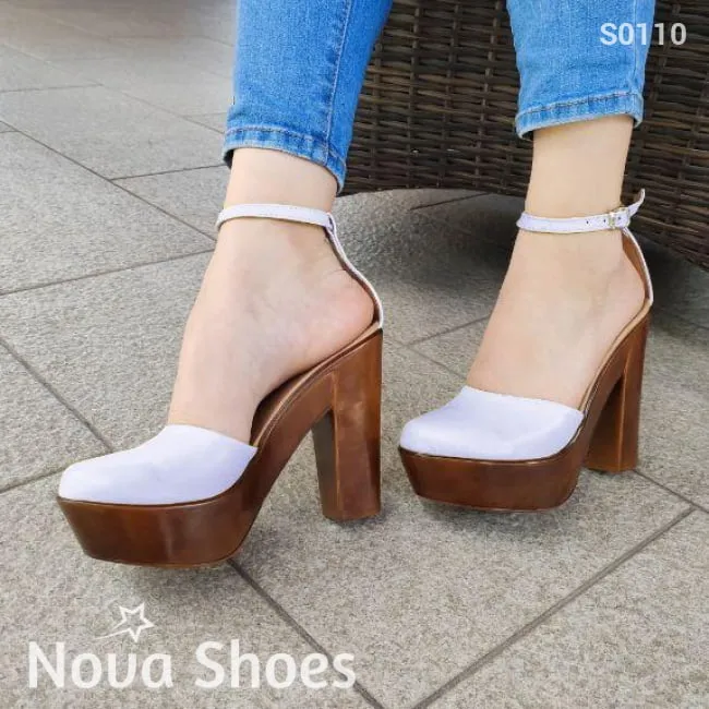 Estilo clásico, cerrado de enfrente. Tacón de resina. Disponible en varios colores