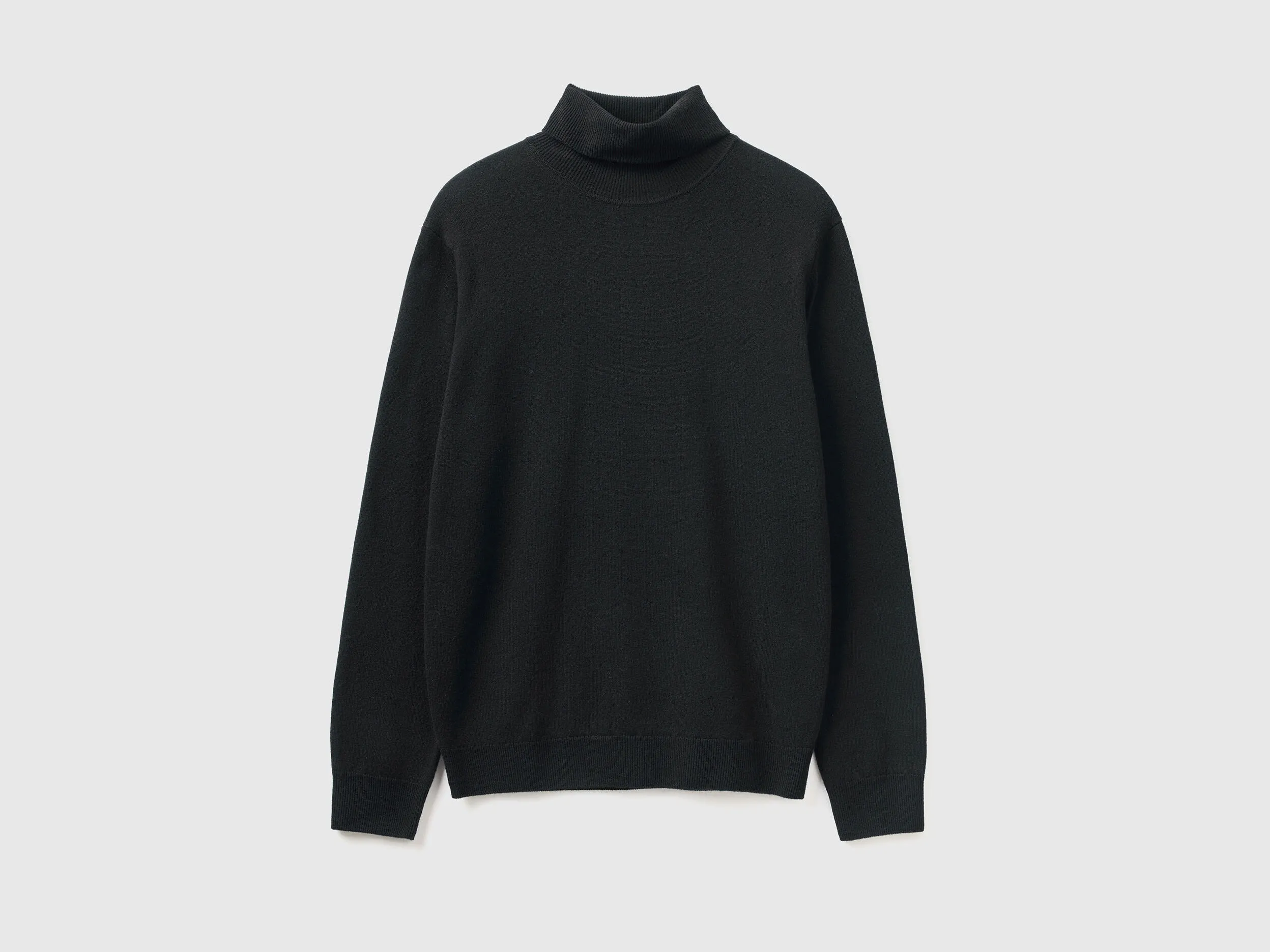 Jersey de cuello cisne negro de pura lana Merina