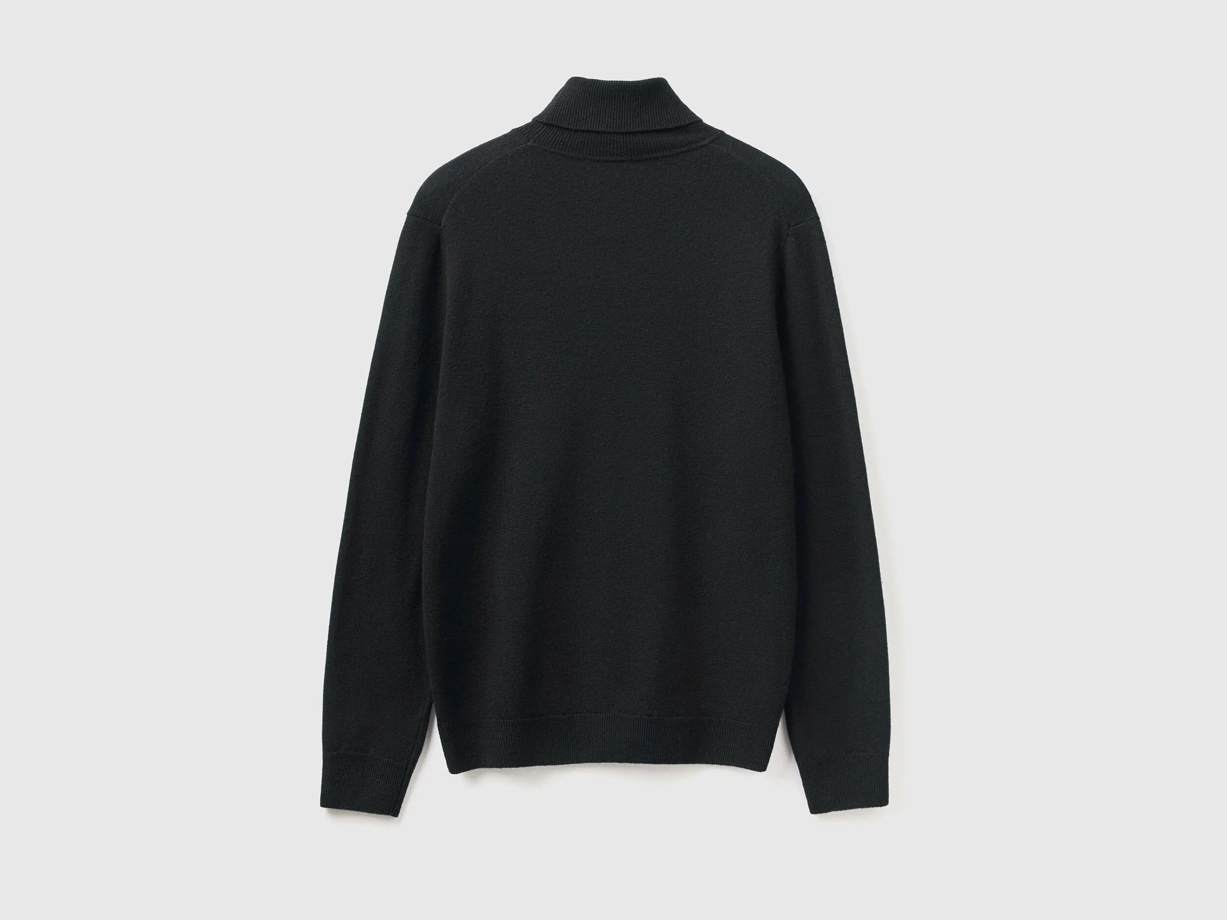 Jersey de cuello cisne negro de pura lana Merina