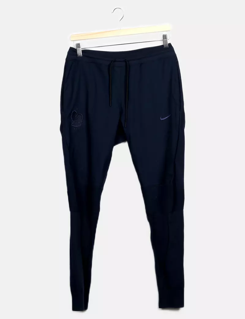 Nike Pantalones de chándal y joggers Skinny o pitillo o slim Impermeables