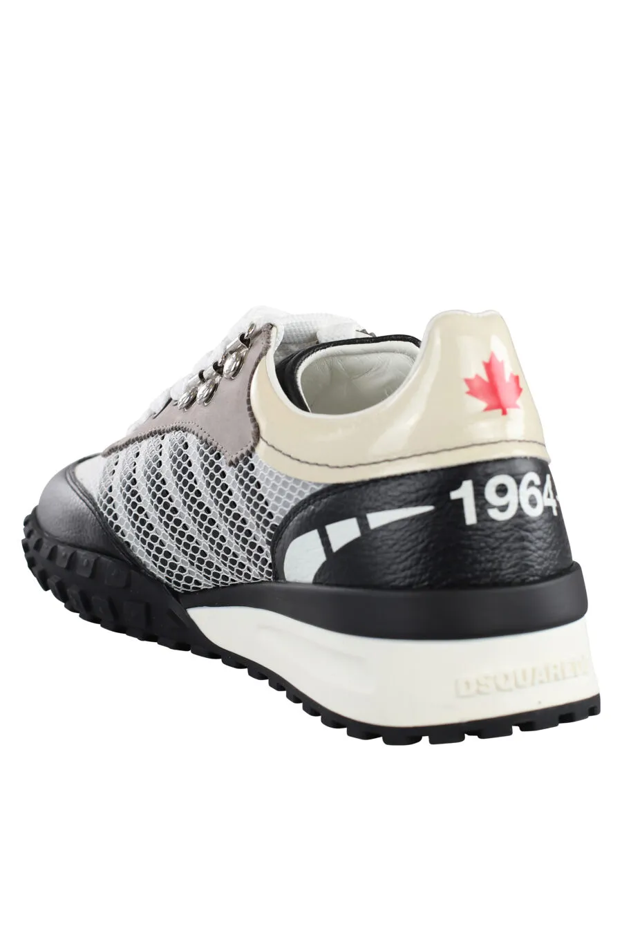 Zapatillas blancas y grises con lineas grises